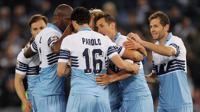 Miroslav Klose #11 with his team mates of SS Lazio celebrates after scoring the team's second goal