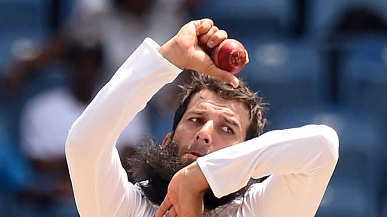 England's cricketer Moeen Ali  delivers a ball during day four of the second Test cricket match between the West 
