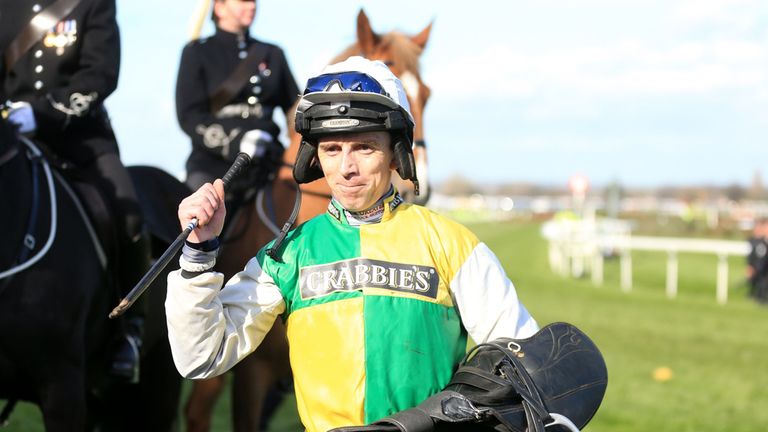Leighton Aspell celebrates after victory in the Crabbie's Grand National