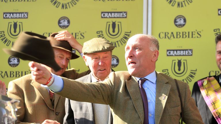 Many Clouds trainer Oliver Sherwood celebrates after victory in the Crabbie's Grand National