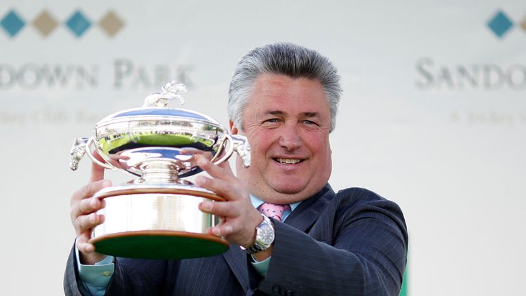 Paul Nicholls with his champion trainer trophy