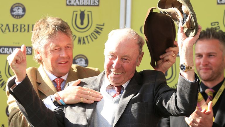 Many Clouds owner Trevor Hemmings celebrates after victory in the Crabbie's Grand National