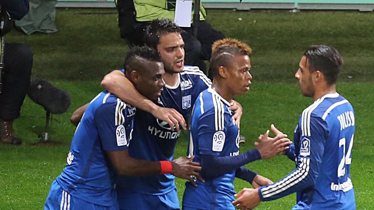Lyon forward Clinton Mua Njie celebrates with team-mates