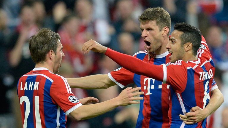 Bayern Munich's midfielder Thomas Mueller (C) celebrates on April 21, 2015. 