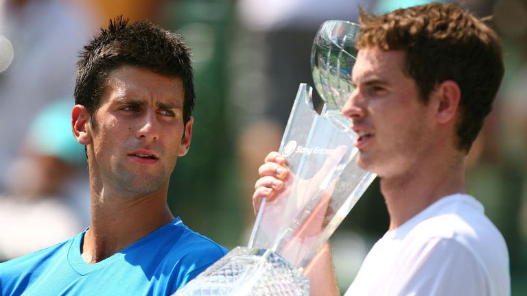 Andy Murray and Novak Djokovic pose with their trophies after the men's final of the Sony Ericsson Open 2009