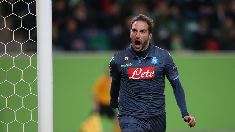 Napoli's Argentinian forward Gonzalo Higuain celebrates after scoring his team's opening goal during the UEFA Europa League first-leg quarter-final
