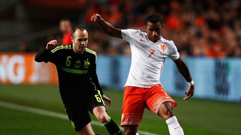 Luciano Narsingh battles with Andres Iniesta during the Netherlands' 2-0 win over Spain