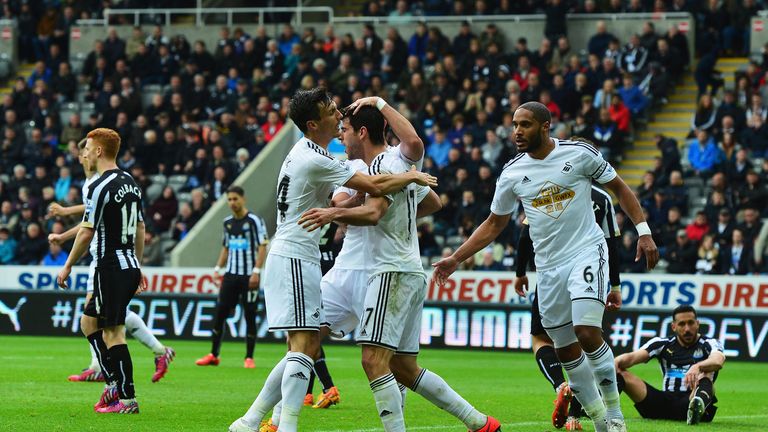 Nelson Oliveria of Swansea City celebrates scoring the equaliser against Newcastle