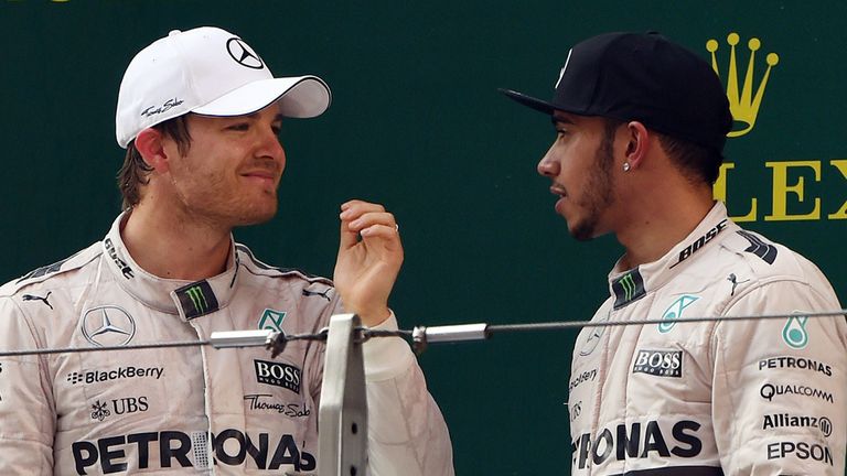 Nico Rosberg (l) with Lewis Hamilton on the podium at the Chinese Grand Prix