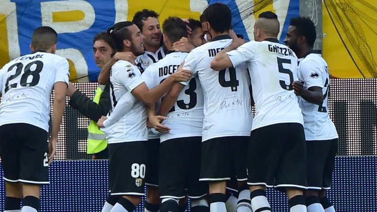Parma's Jose Mauri is congratulated afteer scoring the only goal of the game