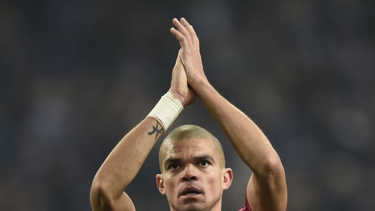 Real Madrid's Portuguese defender Pepe reacts after the last 16, first-leg UEFA Champions League