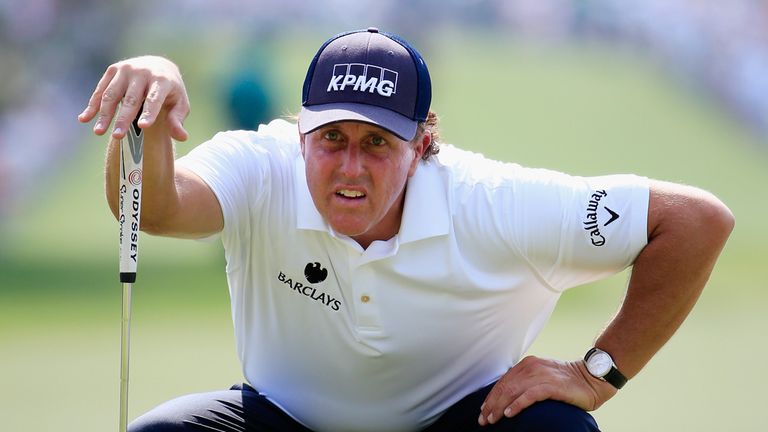 AUGUSTA, GA - APRIL 09:  Phil Mickelson of the United States lines up a putt on the first green during the first round of the 2015 Masters Tournament at Au