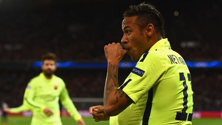 Neymar celebrates scoring the opening goal