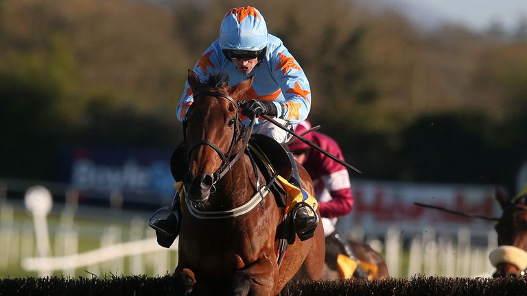 Un De Sceaux, ridden by Ruby Walsh, jumps the last en route to winning the Ryanair Novice Chase at the Punchestown Festival
