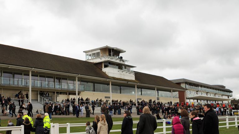 Racegoers make their way into Lingfield Park for the All-Weather Championships Finals Day