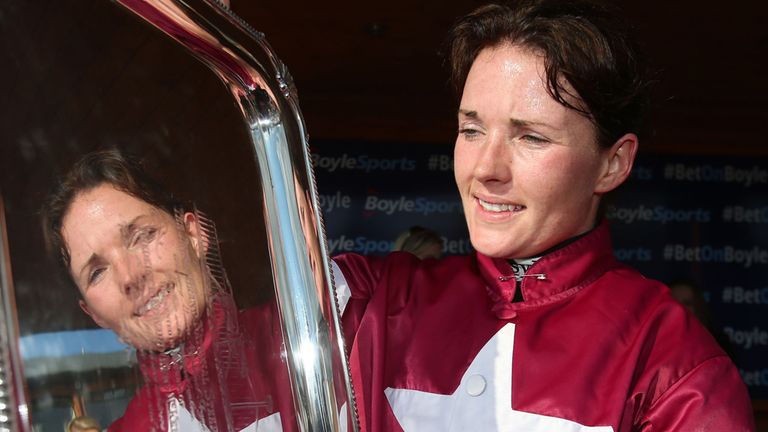 Katie Walsh celebrates after guiding Thunder And Roses to victory in the BoyleSports Irish Grand National.