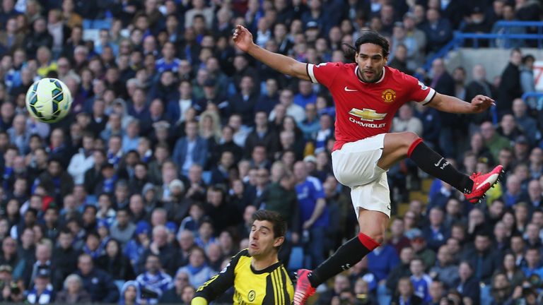 Manchester United's Radamel Falcao competes with Chelsea's Thibaut Courtois