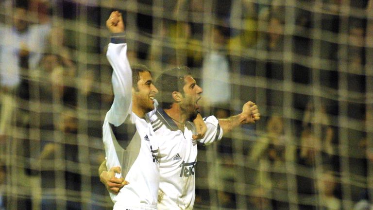 MADRID, SPAIN - MARCH 6:  Real Madrid's Raul (L) celebrates with Figo after scoring his second goal against Leeds 06 March 2001 in their Champions League m