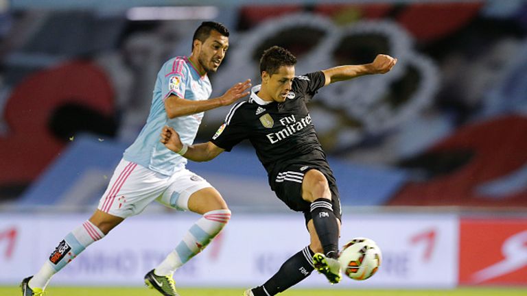 VIGO, SPAIN - APRIL 26: Chicharito Hernandez (R) of Real Madrid score the goal during the La Liga match between Celta de Vigo and Real Madrid