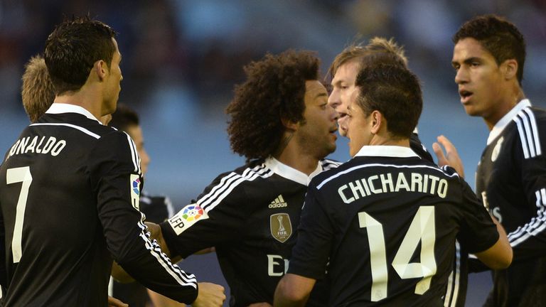 Real Madrid players celebrate after scoring a goal during the Spanish league football match Celta Vigo vs  Real Madrid CF