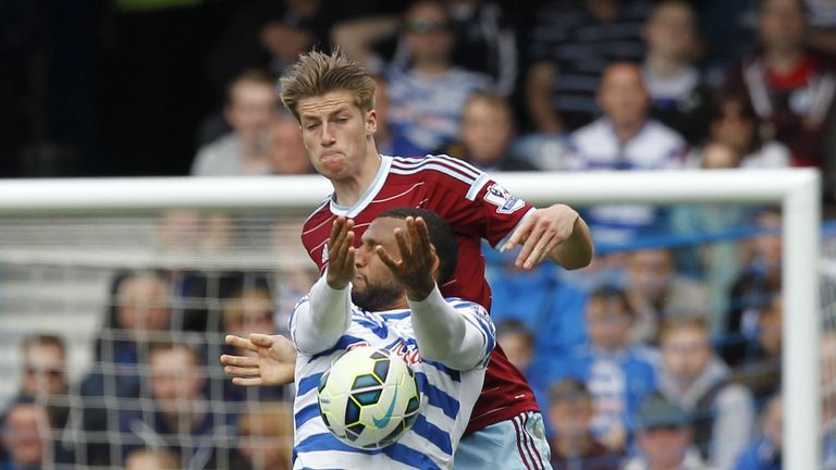 Reece Burke battles with Matt Phillips