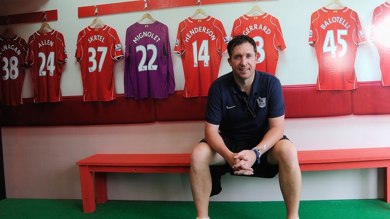 Robbie Fowler poses for a photograph inside the Liverpool tent during the Premier League 'Live' event  in India