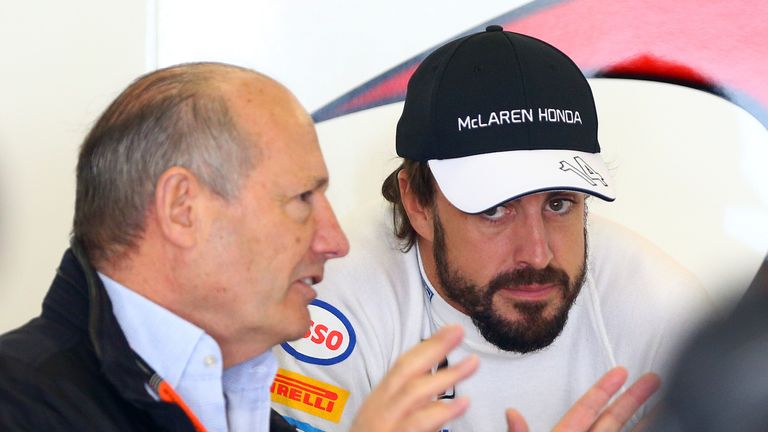 Fernando Alonso speaks with Ron Dennis