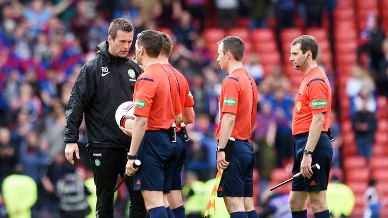 Celtic manager Ronny Deila (left) speaks to referee Steven McLean at full-time 