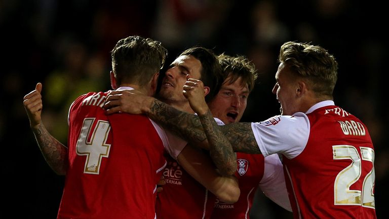 ROTHERHAM, ENGLAND - APRIL 28:  Matt Derbyshire of Rotherham celebrates scoring the opening goal with team mates during the Sky Bet Championship match betw