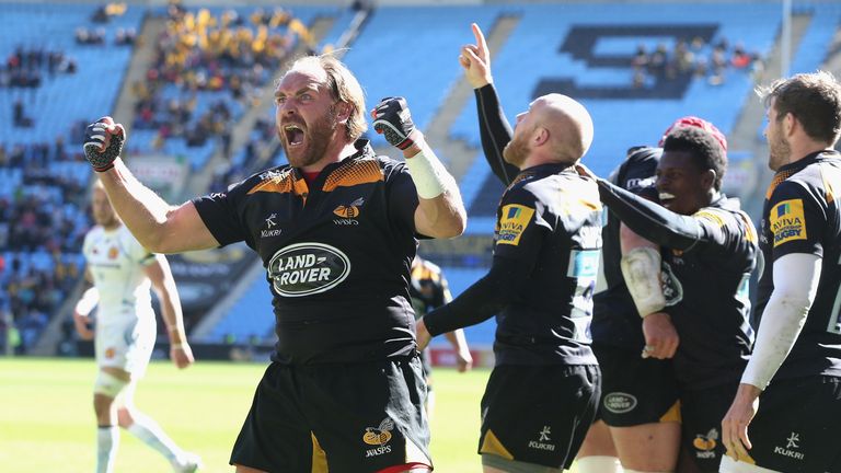 Wasps fly-half Andy Goode celebrates Joe Simpson's late try against Exeter