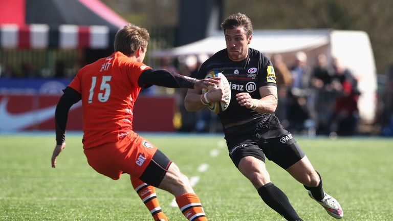 Chris Wyles of Saracens takes on Mathew Tait Leicester Tigers