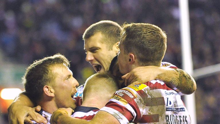 Wigan ran in eight tries as they comfortably registered their fifth win of the season