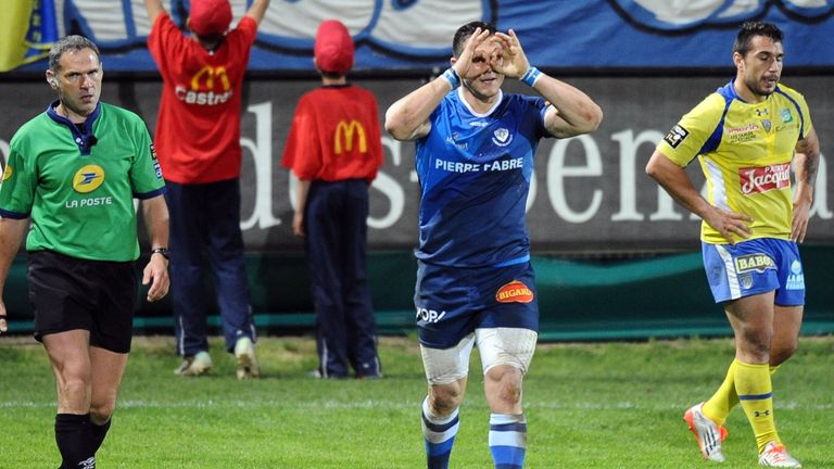 Castres winger Remy Grosso celebrates after scoring a try against Clermont Auvergne