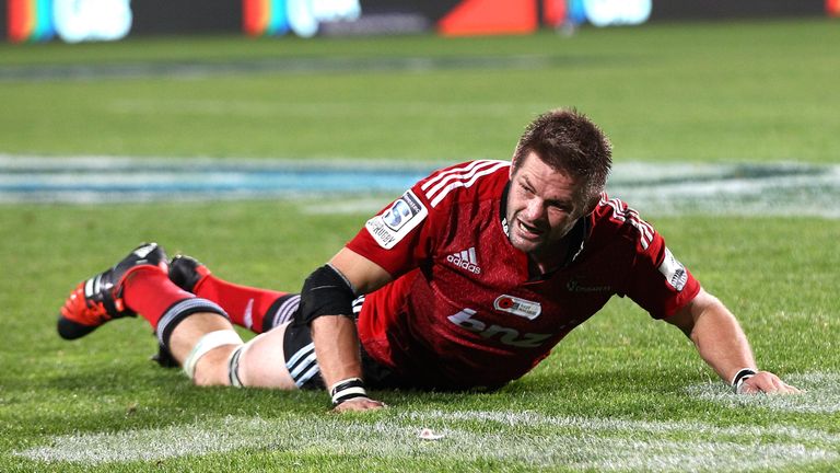 Crusaders flanker Richie McCaw lays injured during the Super Rugby match against the Blues
