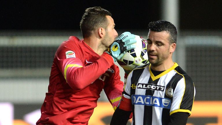 UDINE, ITALY - APRIL 28:  Samir Handanovich (L) goalkeeper or FC Internazionale Milano competes with Antonio Di Natale of Udinese Calcio during the Serie A
