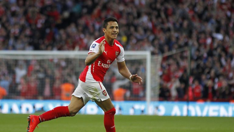 Arsenal's Chilean striker Alexis Sanchez celebrates scoring his second goal during the FA Cup semi-final between Arsenal and Reading