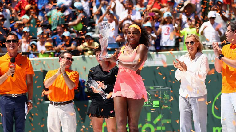 KEY BISCAYNE, FL - APRIL 04:  Serena Williams of the United States holds aloft the Butch Bucholz Trophy after her straight sets victory against Carla Suare