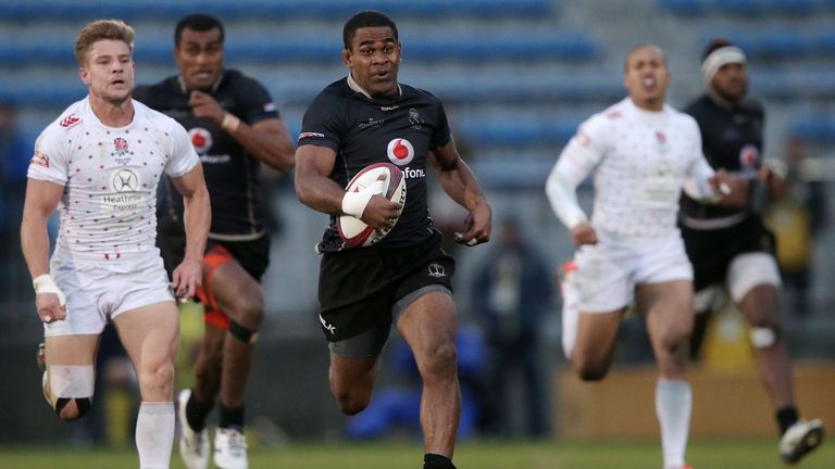 Vatemo Ravouvou of Fiji makes a break against England on day one of the Tokyo Sevens