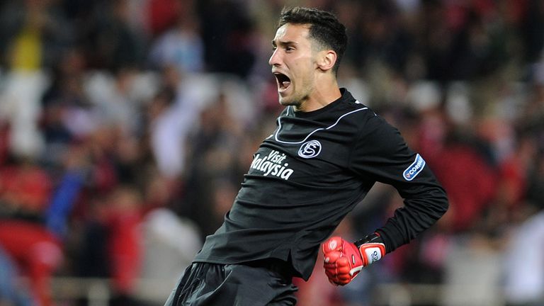 Sevilla's goalkeeper Sergio Rico celebrates