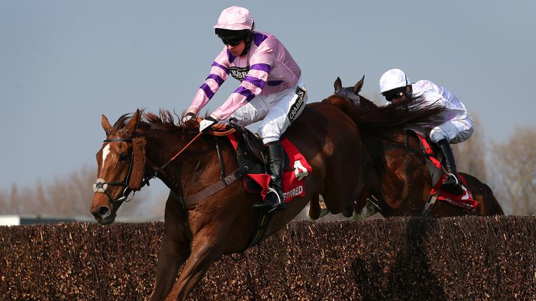 Silviniaco Conti, ridden by Noel Fehily, clears the second last fence on his way to victory in the Betfred Bowl at Aintree 