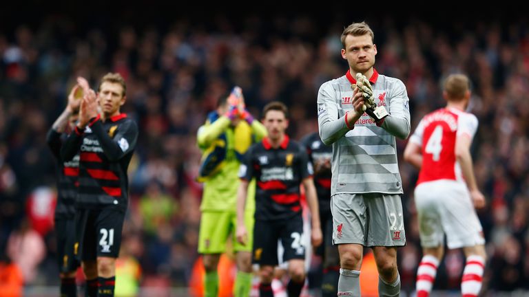 Simon Mignolet of Liverpool applauds the fans after the Barclays Premier League match between Arsenal and Liverpool at Emirates