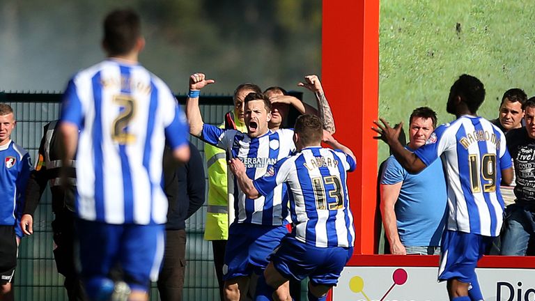 Chris Maguire celebrates Sheffield Wednesday's late equaliser