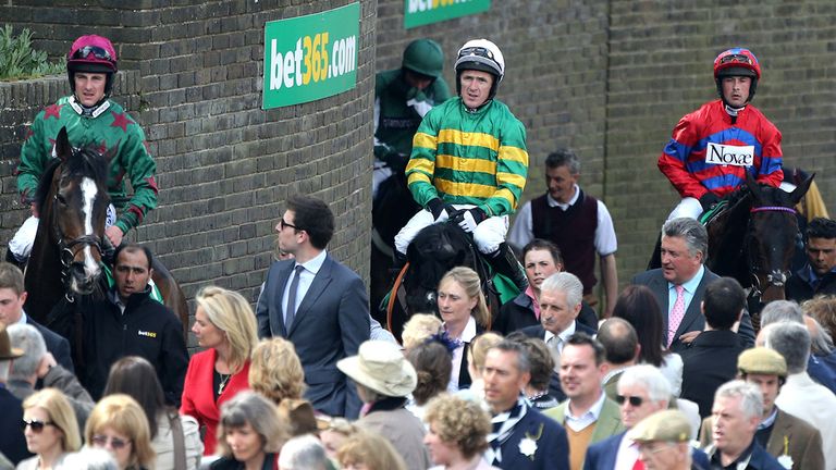 Tony McCoy walks back in on Mr Mole after finishing third 