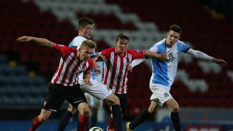 BLACKBURN, ENGLAND - APRIL 13:  Lewis Mansell (2nd L) and Connor Thomson (R) of Blackburn Rovers compete with Jason McCarthy and Dominic Gape of Southampto