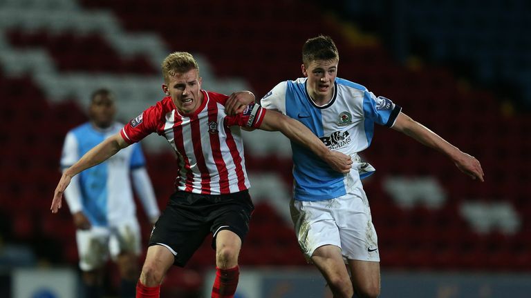 Lewis Mansell of Blackburn Rovers competes with Jason McCarthy of Southampton during the Under 21 Premier League Cup Final 