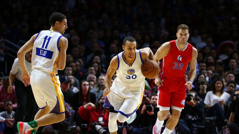 LOS ANGELES, CA - DECEMBER 25:  Stephen Curry #30 of the Golden State Warriors starts the fast break upcourt 