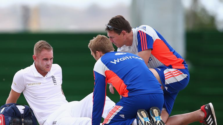 BASSETERRE, ST KITTS, SAINT KITTS AND NEVIS - APRIL 08:  Stuart Broad of England is treated by medical staff after landing awkwardly whilst bowling during 