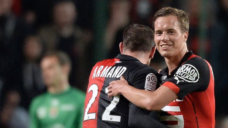 Rennes' Norwegian midfielder Anders Konradsen (R) and Rennes' French defender Sylvain Armand celebrate at the end of the match between Rennes and Nice