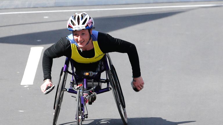 BOSTON, MA - APRIL 21:  Tatyana McFadden celebrates as she wins the women's wheelchair division of the 2014 B.A.A. Boston Marathon on April 21, 2014 in Bos
