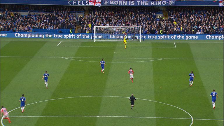 Thibaut Courtois can only watch on as Charlie Adam's shot flies over him
